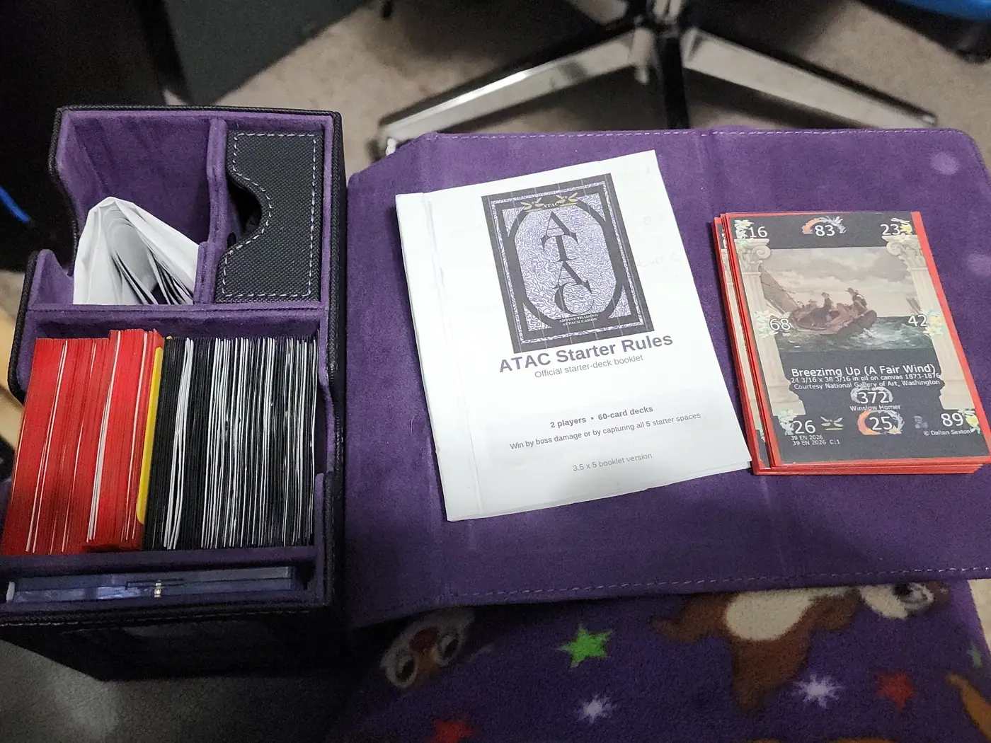 ATAC cards, storage box, and rule booklet