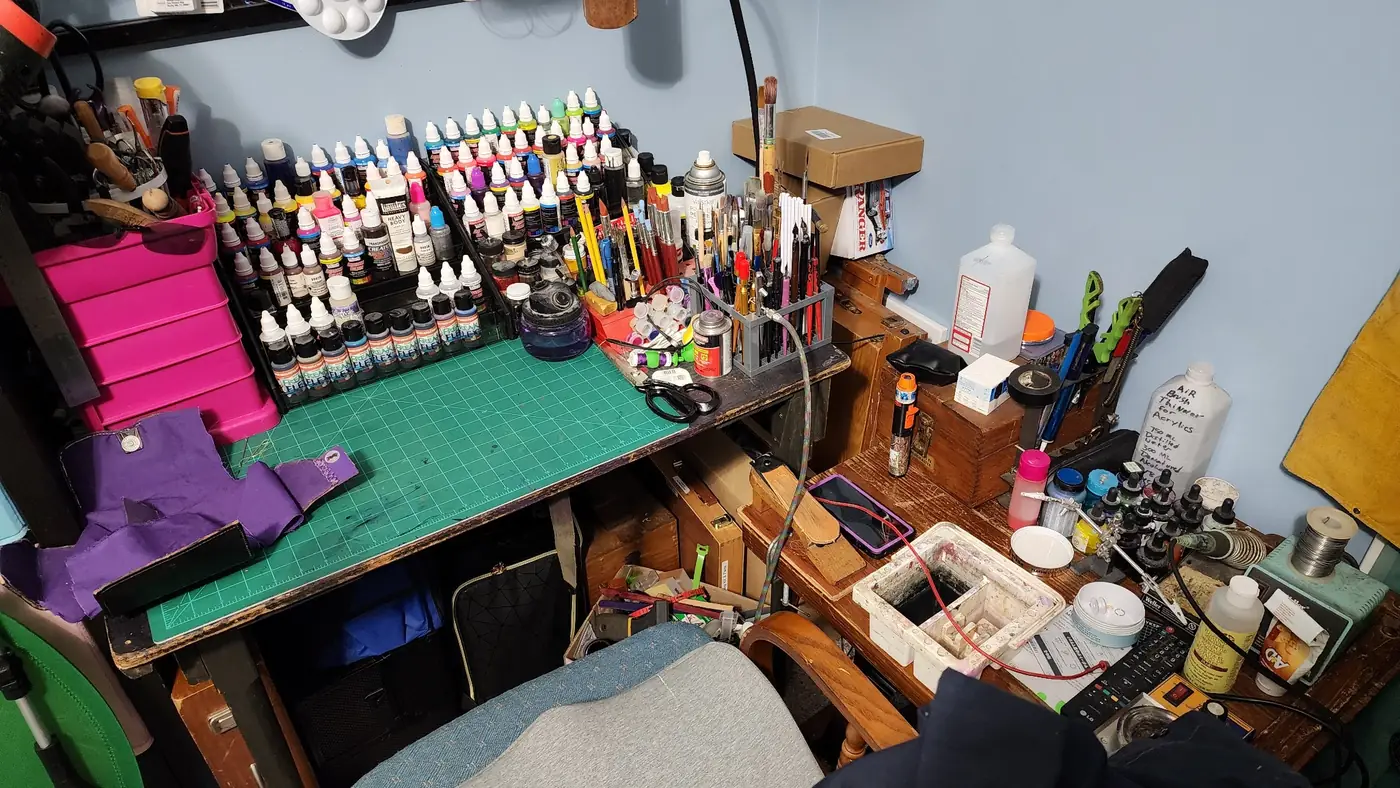 Artist workspace with paints and tools